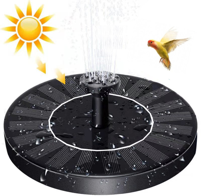 Solar floating fountain in a garden bird bath