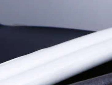 White under-door draught excluder