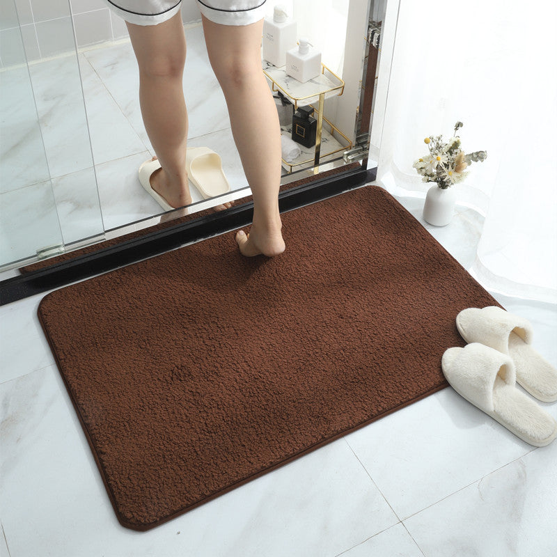 Soft plush absorbent bath mat in chocolate brown