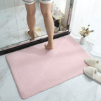 Soft plush absorbent bath mat in pink