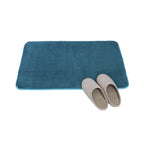 Soft plush absorbent bath mat in teal blue with slippers