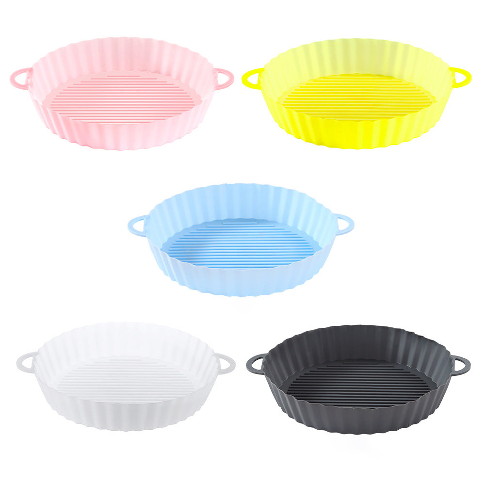 Round silicone air fryer liners with handles in pink, yellow, light blue, white and dark grey