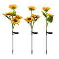 Solar sunflower garden stake light with four glowing flower heads