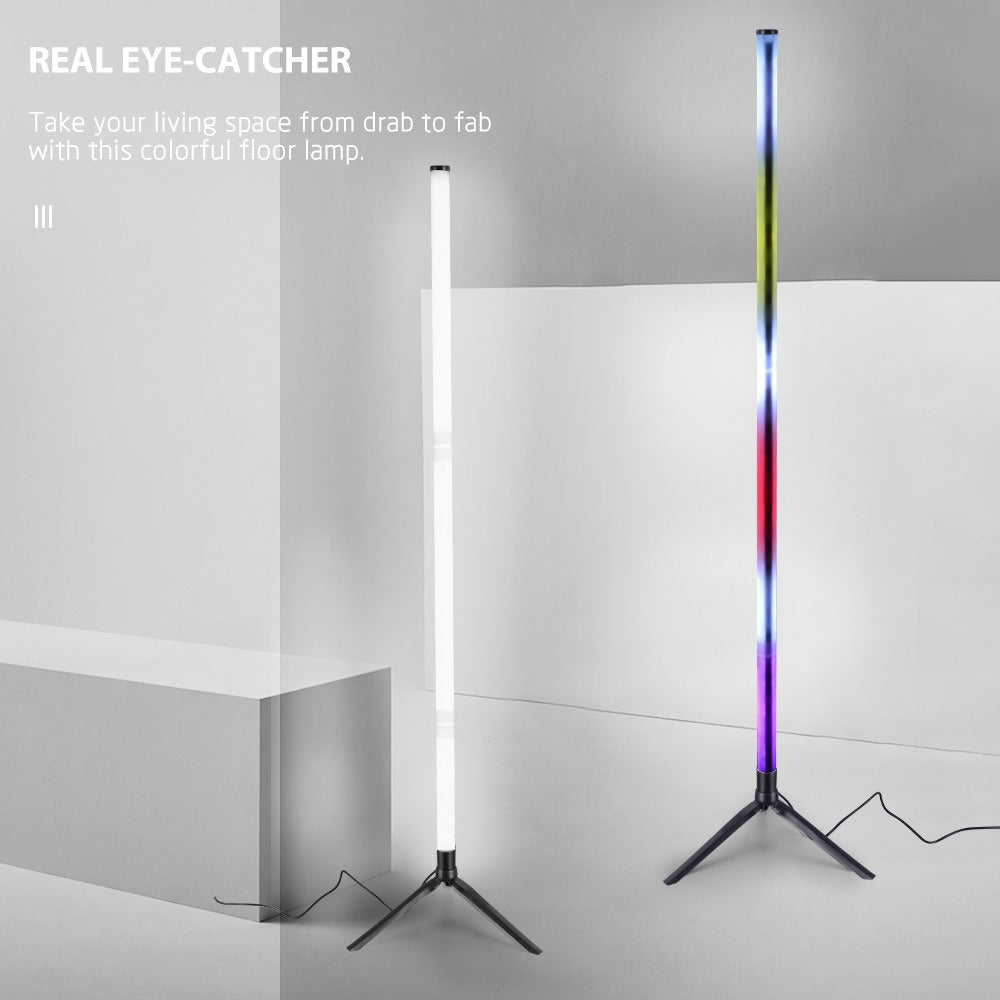 Slim RGB LED corner floor lamp on a tripod stand glowing in colour