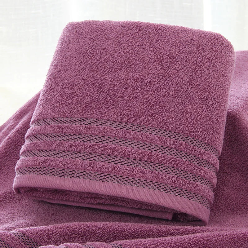 Striped cotton towel in mauve