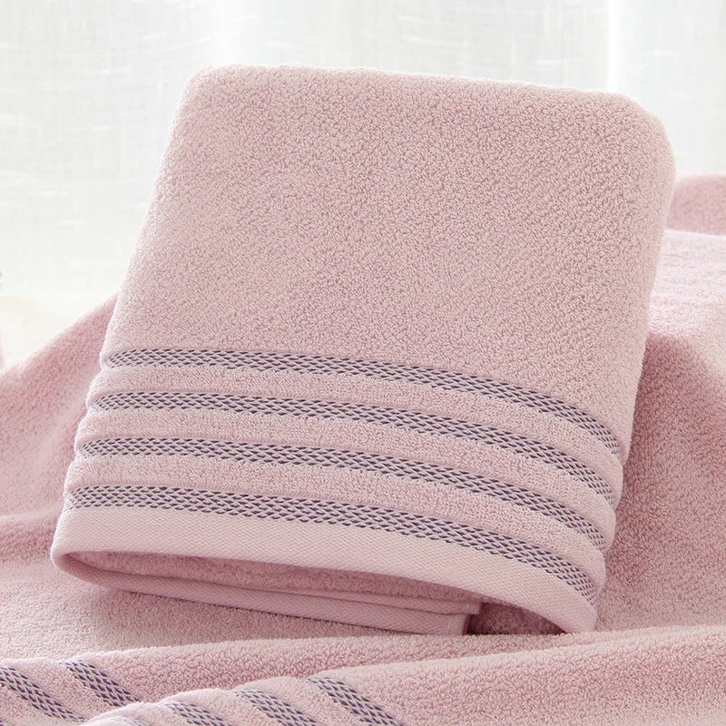 Striped cotton towel in blush pink