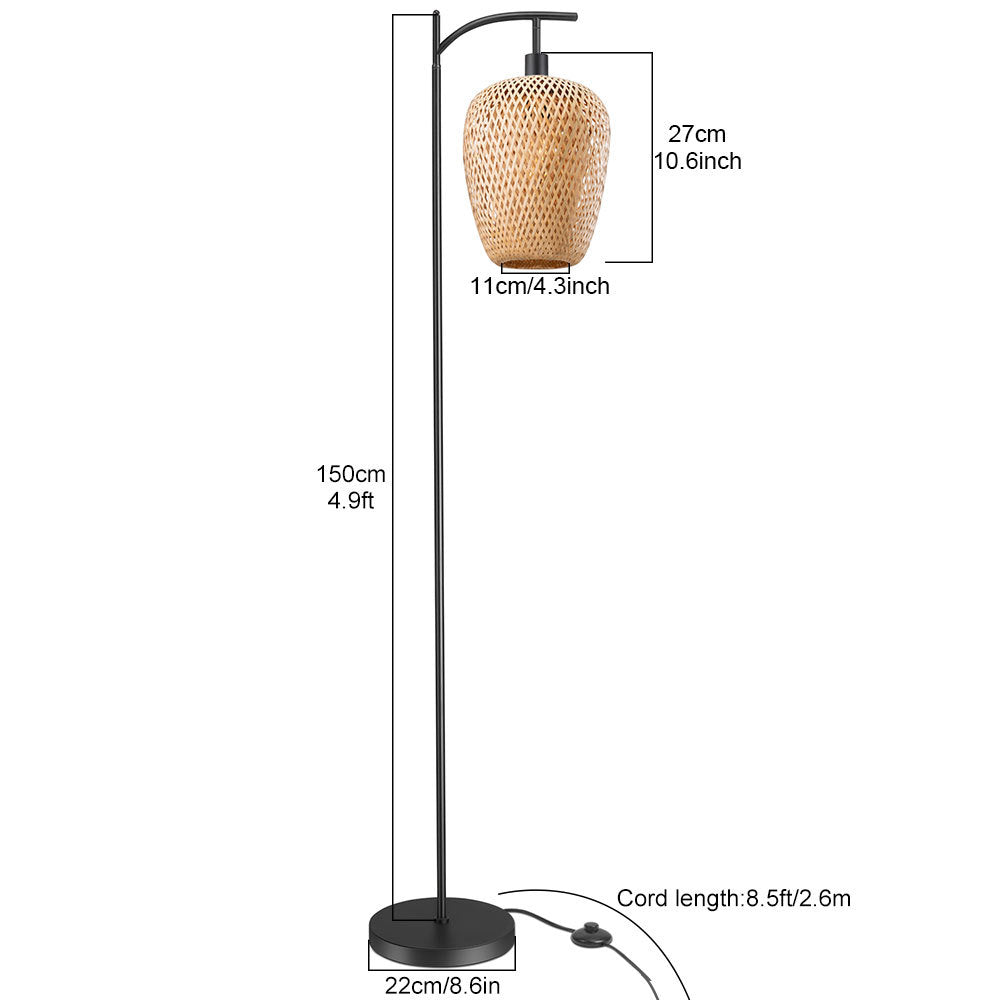 Black arc floor lamp with a hanging woven rattan-look shade